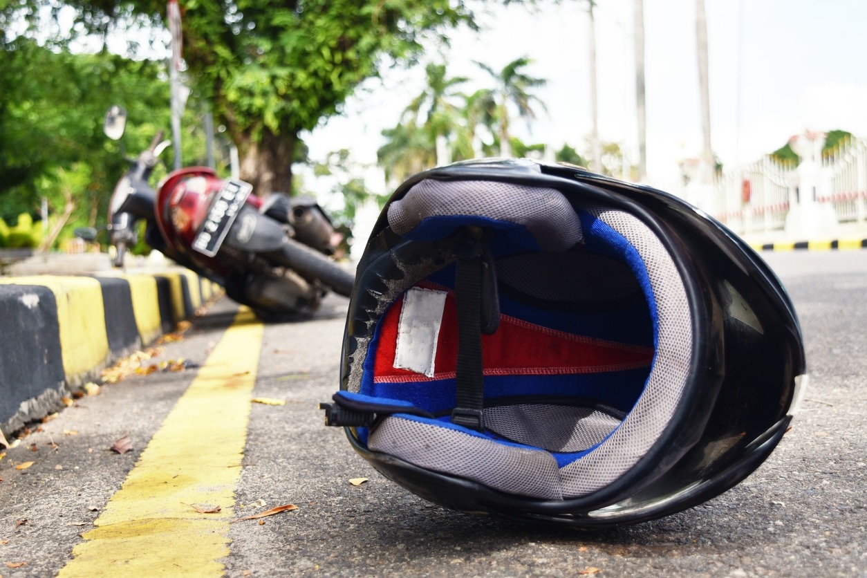 helmet on the road after a motorcycle accident