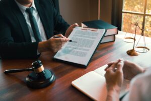 Attorney and client discussing legal options in law office