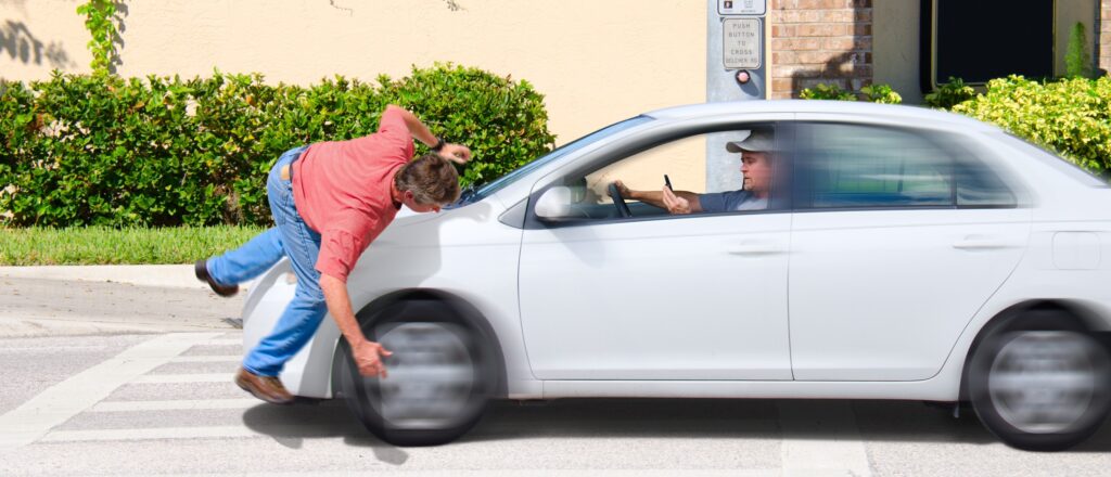distracted driver hitting pedestrian