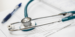 stethoscope and medical documents
